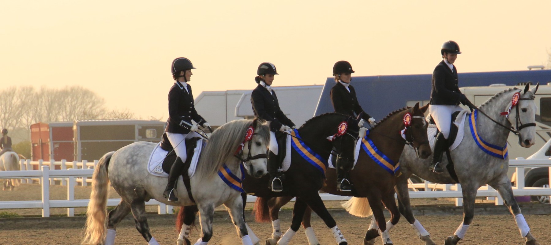 South Durham Enjoy A Lap Of Honour After Winning The Senior Dressage Team Title