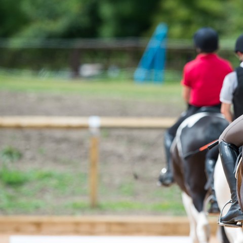 riding on horses