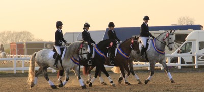 South Durham Enjoy A Lap Of Honour After Winning The Senior Dressage Team Title