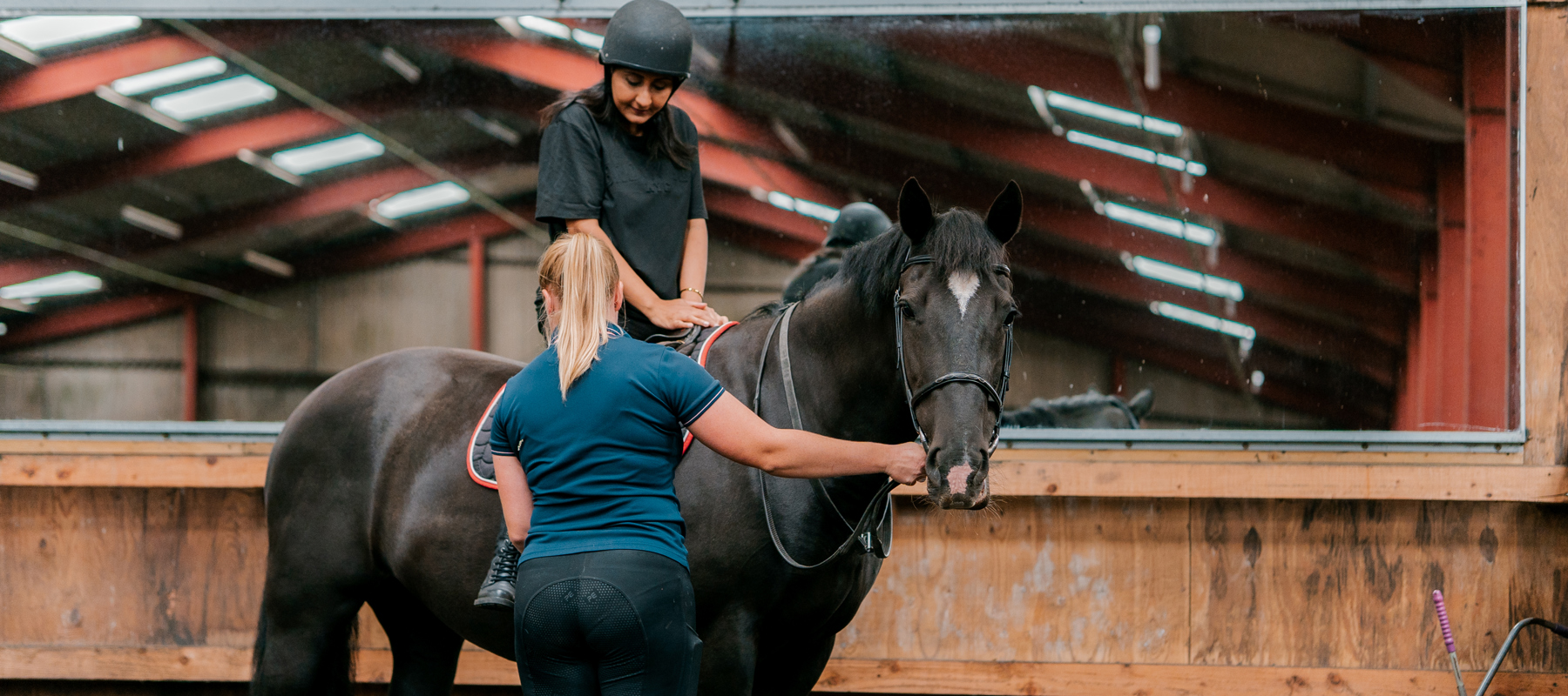 Coach And Rider At The Start Of A Lesson