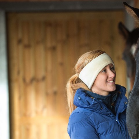 woman and black horse