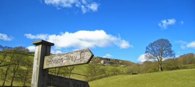 wooden sign pennine way