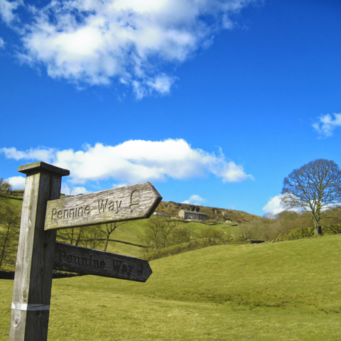 wooden sign pennine way