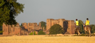 riding on the field near castle
