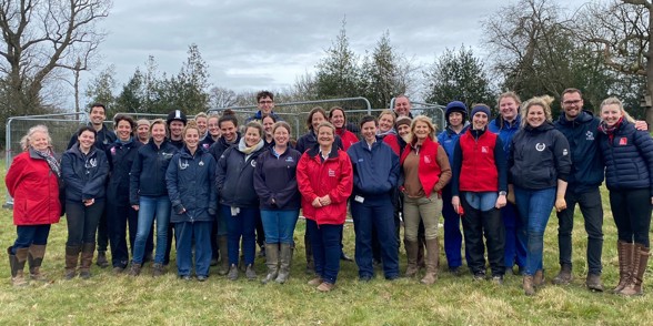 group of vets and people who have been helping at a horse health and welfare event