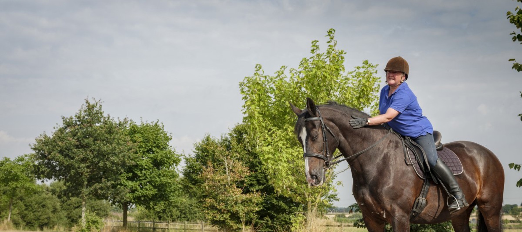 woman riding a horse