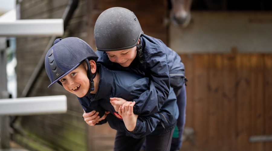 smiling children wearing helmet