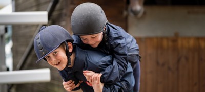smiling children wearing helmet