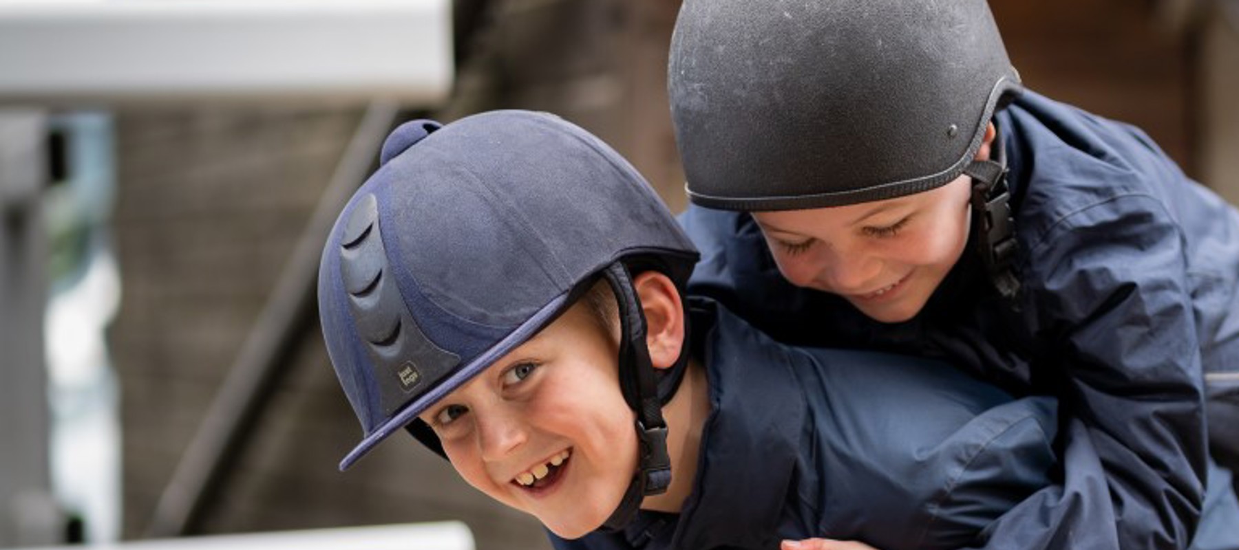 smiling children wearing helmet