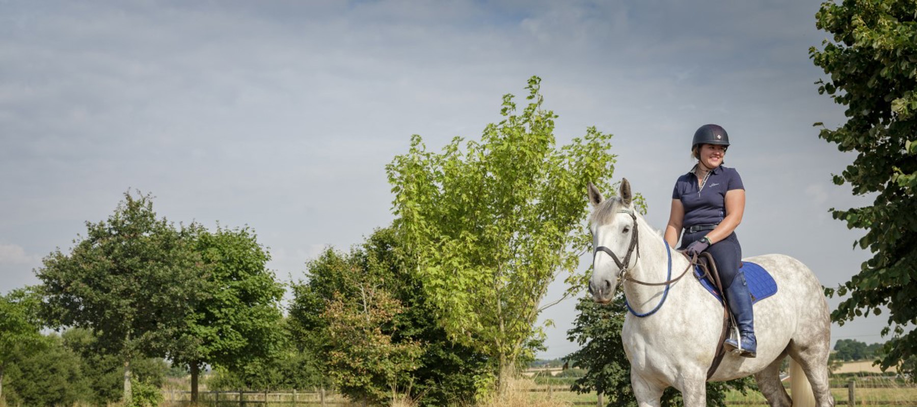 woman riding a horse