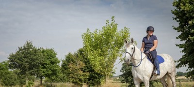 woman riding a horse